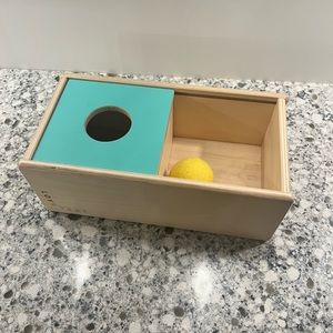 Lovevery sliding top box geared toward 11-12 month olds